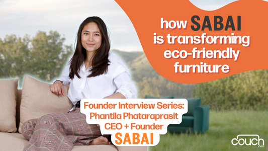 Woman with dark hair, a white shirt and plaid trousers sits on a beige sofa set against a nature background. Text says 'how Sabai is transforming eco-friendly furniture' and 'founder interview series: Phantila Phataraprasit CEO+Founder'