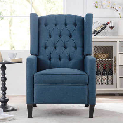 A Manual Wing Chair Recliner in blue accents a bright room with white walls and a large window. A small side table, a wine cabinet, and a vase of white flowers complete the setting, all illuminated by natural light.