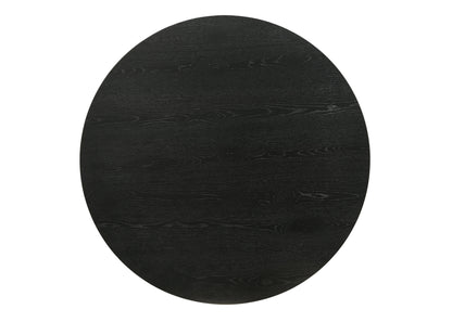 The Jasper - Round Table features a black, round tabletop with a textured wood grain pattern.