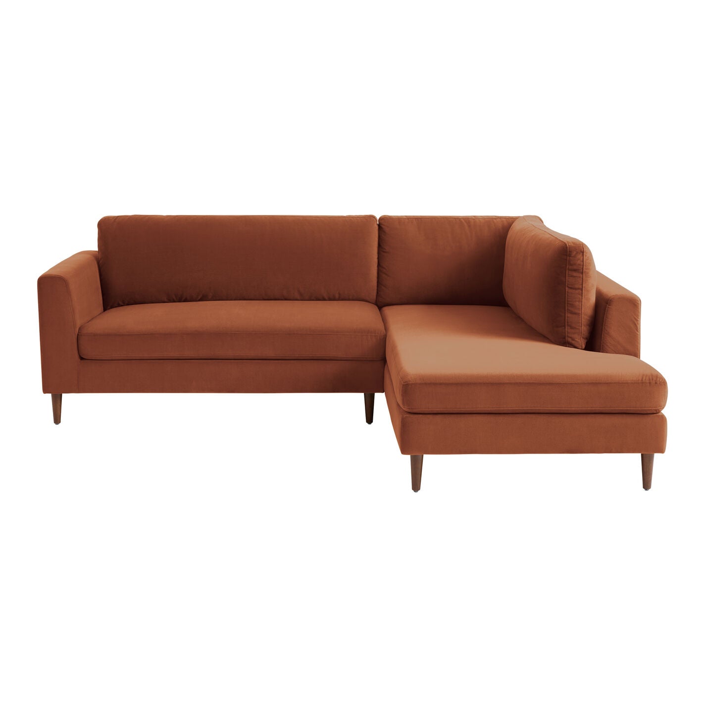 The Camile Velvet section features a right-facing L-shaped design with a chaise lounge, showcasing a minimalist style and wooden legs. Its smooth upholstery offers a modern and cozy appearance.