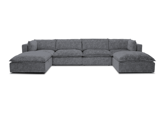 The Haine Modular Grand U-Sofa Sectional is a spacious, contemporary gray sofa featuring plush cushions arranged in a U-shape, set against a white background.