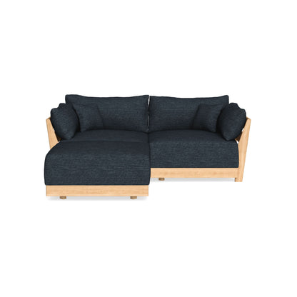 A modern black sofa with a wooden frame and legs, featuring cushioned seats and a left-side chaise lounge. The sofa has clean lines and plush back pillows, set against a plain white background.