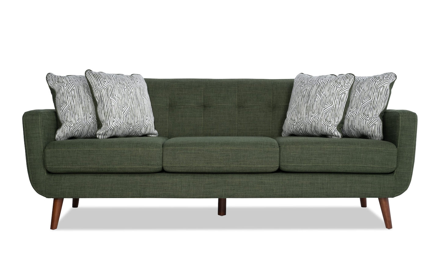 Introducing the Bettie 86'' Sofa: a modern piece featuring a vibrant green color, three seat cushions, four decorative pillows with a striking black and white pattern, and elegant wooden legs.