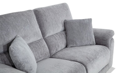 Experience ultimate comfort with the Renegade Gray 125'' Power Reclining 6 Piece Sectional. This sophisticated sofa set, in light gray, includes two matching cushions and showcases a plush, textured fabric that exudes coziness and warmth. Designed with spacious seating, it features an armrest on one side for added relaxation. Plus, stay connected with its convenient USB port integration.