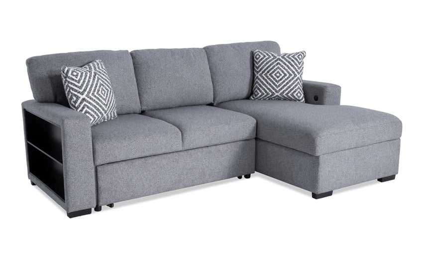 Introducing the Playday Beige 93'' 2 Piece Left Arm Facing Pop-Up Sleeper Chaise Sectional, showcasing a minimalist modern aesthetic. This sectional sofa includes an attached chaise lounge and two chic geometric patterned throw pillows, complemented by built-in storage shelves on one armrest.