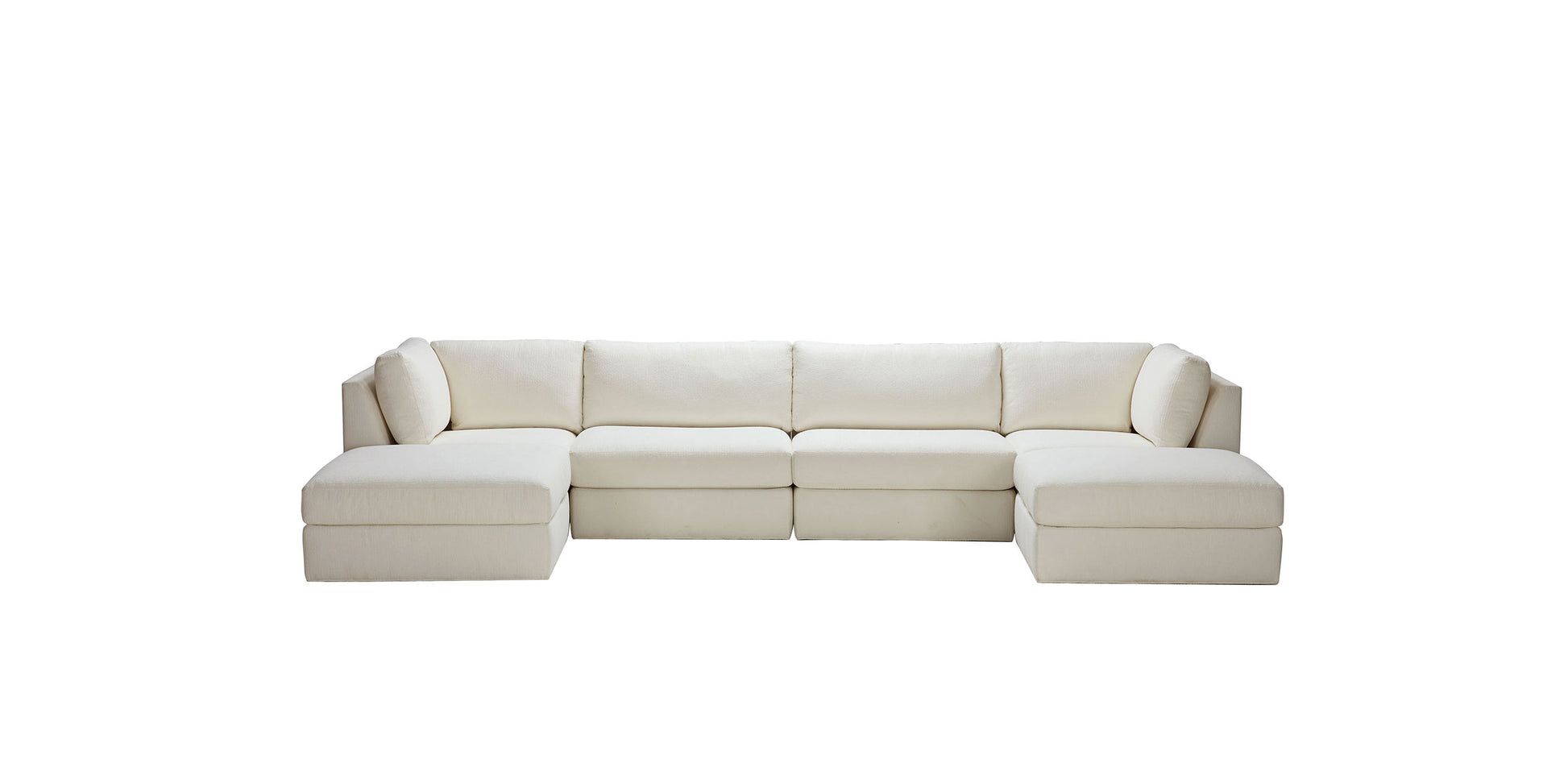 The Daydreamer Modular Six-Piece Sectional, a spacious L-shaped sofa in beige, features clean lines and plush cushions, beautifully contrasted against a plain white background.