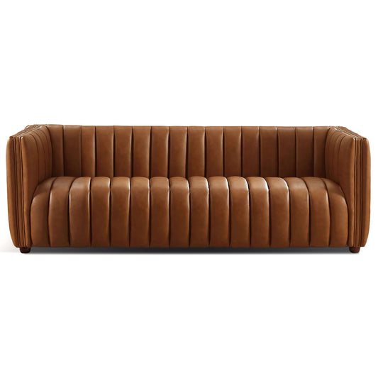 The April Mid-Century Modern Luxury Tight Back Boucle Couch showcases a contemporary touch with vertical tufted sections, high arms, and a sleek, structured look. The brown leather sofa is elegantly set against a white background.