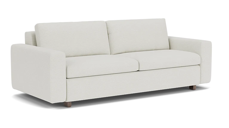 Introducing the Reva Storage Sofa: a contemporary cream-colored sofa featuring two cushions and straight armrests, elegantly set against a simple black background. It boasts a minimalist design with short, dark wooden legs.