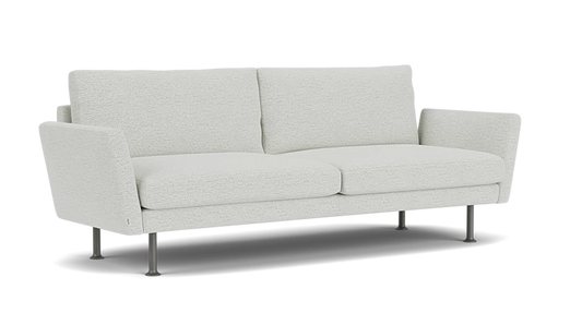 The Form 92" Sofa is a modern piece with light gray upholstery, straight lines, and a minimalist design. It features two seat cushions, two back cushions, and thin metal legs that contribute to its contemporary look.