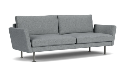 The Form 92" Sofa is a modern piece in gray, featuring two cushions and slim metal legs set against a plain black background. Its design includes slightly angled armrests and embodies a minimalist style.