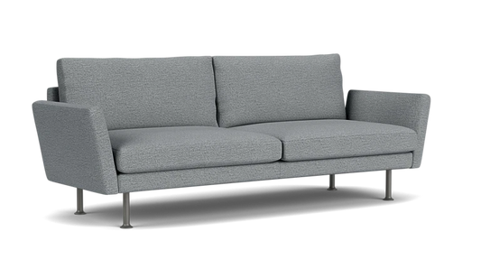 The Form 92" Sofa is a modern piece in gray, featuring two cushions and slim metal legs set against a plain black background. Its design includes slightly angled armrests and embodies a minimalist style.