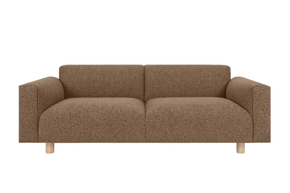 Introducing the Koti 2-seater Sofa: a modern brown upholstered piece with textured fabric and elegant wooden legs. Its minimalist design includes two seat cushions and sleek, streamlined sides without visible armrests, all set against a plain white background.