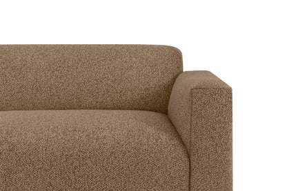 Close-up of the Koti 2-seater Sofa in modern, textured olive green against a white background. The image showcases the sofa's left side, emphasizing its armrest and the woven detail of the fabric.