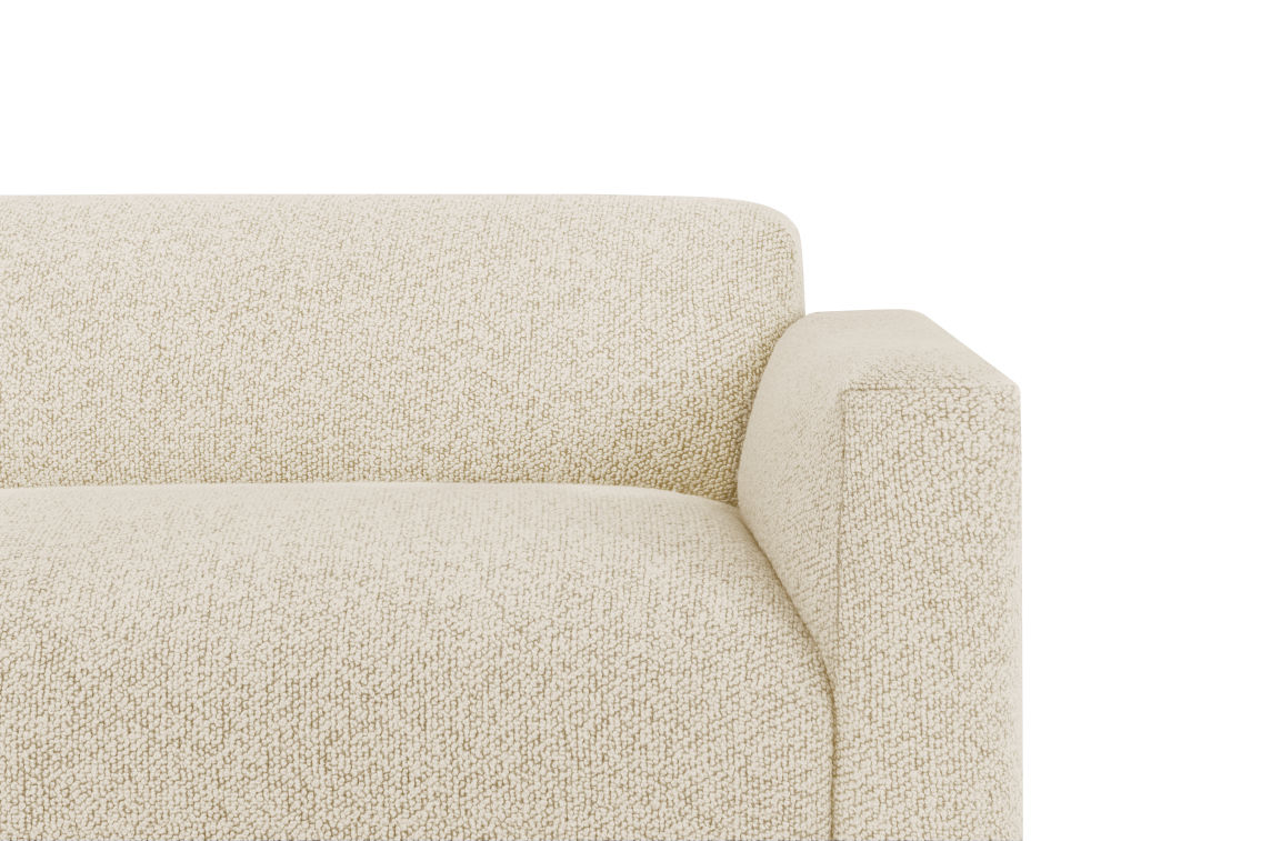 Close-up of the Koti 3-seater Sofa, featuring a beige, textured fabric and modern rectangular armrest design, set against a plain white background.