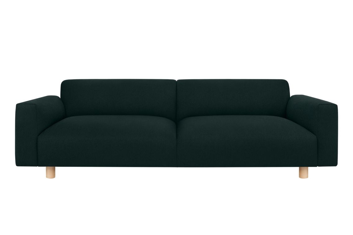 Introducing the Koti 3-seater Sofa: a modern piece in dark green, featuring clean lines and low backrests. It comes with wide armrests and wooden cylindrical legs, complemented by smooth, comfortable upholstery that perfectly suits a contemporary living room setting.