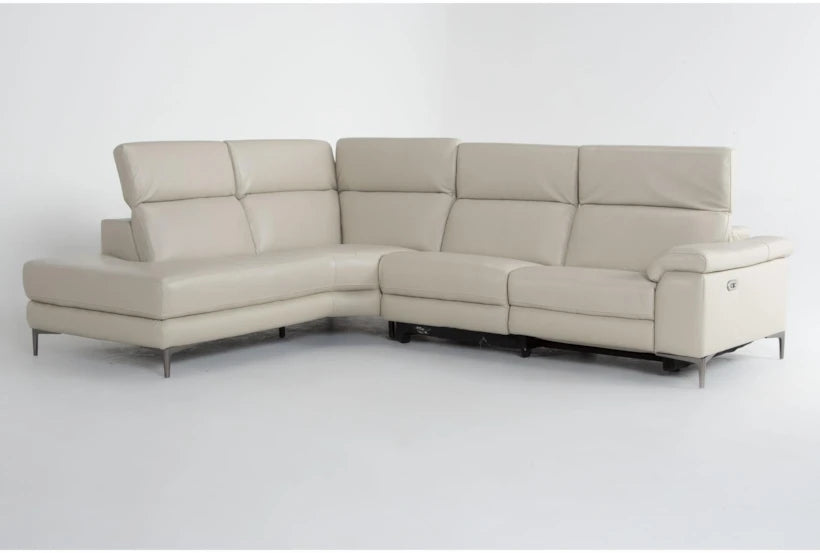 The Bennett Leather 2 Piece Reclining Sectional with Left Arm Facing Chaise features a modern design in beige, boasting clean lines and metal legs. This L-shaped sectional includes high backrests and is presented against a plain white background.