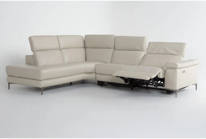 The Bennett Leather 2 Piece Reclining Sectional, featuring a contemporary L-shape in beige with a left arm facing chaise, comes with three headrests and a reclining seat on the right end, presented against a plain white background.