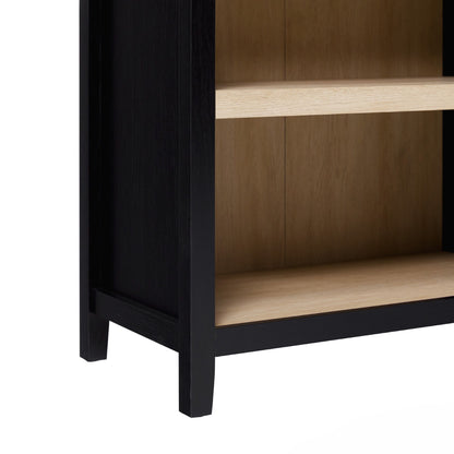 Close-up of a Modern 5 Shelf Open Arched Bookshelf featuring a black frame, light wood finish shelves with matching interior, and standing on four legs.