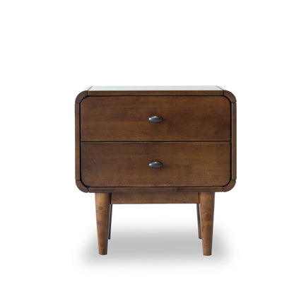 The Alexa nightstand features a mid-century modern style with a warm brown finish. It boasts two drawers with dark metal handles, rounded edges, and stands on four tapered legs, all set against a white backdrop.