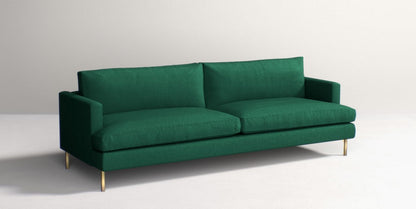 The Bowen 91" Sofa is a green, modern piece featuring two back cushions and sleek armrests, perfect for a minimalist setting. It is designed with short, angled golden legs that provide a striking contrast to its deep green upholstery.