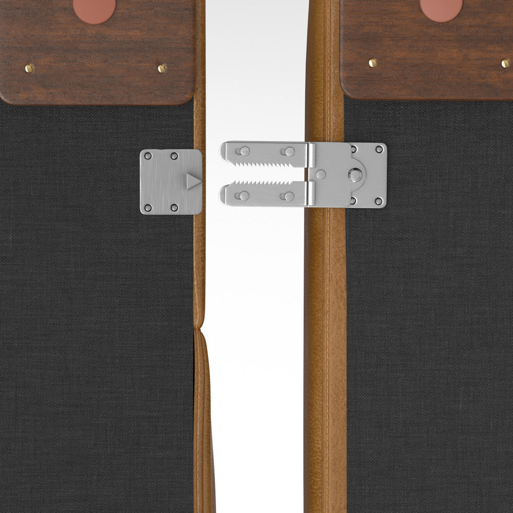 Two wooden folding panels connected by a silver latch hinge mechanism. The panels have black fabric sections and a brown leather accent with brass rivets on top. The hinge is centrally positioned, allowing the panels to fold together.