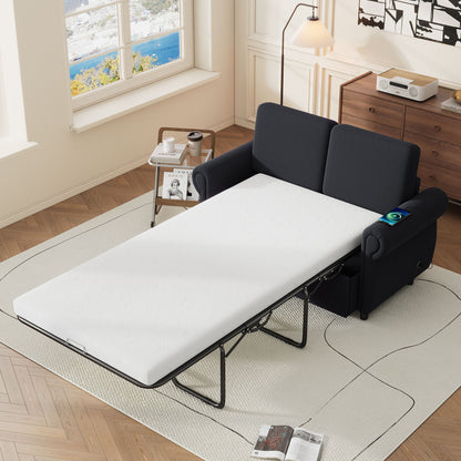 The Pull Out Sofa Bed Loveseat Sleeper with Twin Size Memory Mattress and USB ports sits in a bright room with an ocean-view window. A side table holds magazines and coffee, while a dresser, lamp, beige rug, and wooden floor complete the cozy scene.