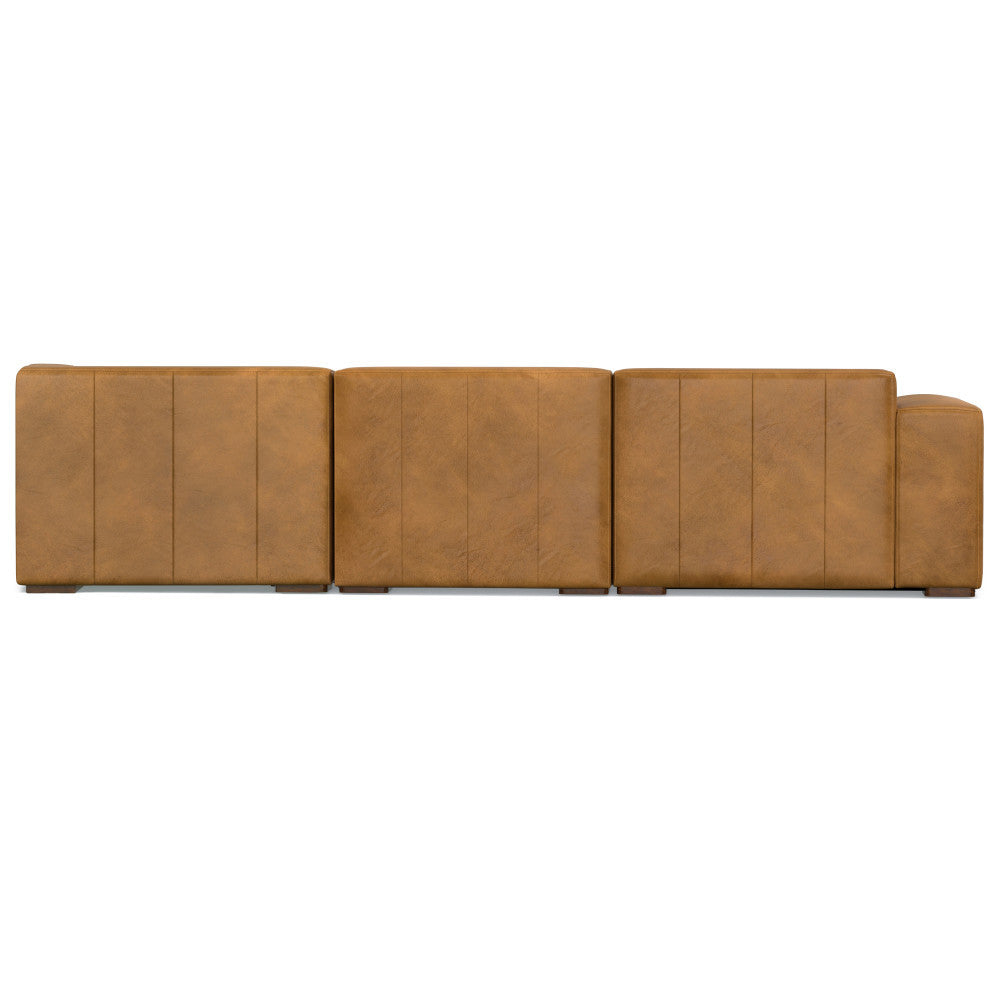 Brown leather sectional sofa with three segments and a modern, minimalist design. The sofa has clean lines and a backrest that spans the length of the segments, creating a unified appearance. Viewed from the back.