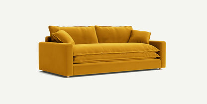 The Meriwether Sofa in mustard yellow, showcasing plush cushions and a modern design, is placed against a plain light background. Its features include straight armrests and a low back.