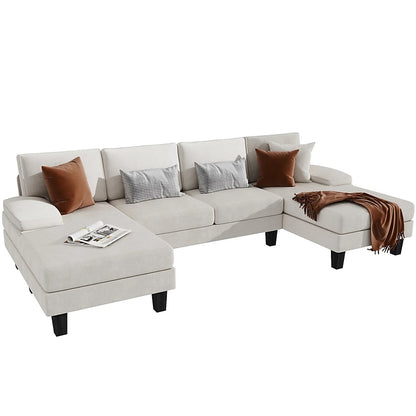 The Vineego Modern Gray Chenille Sectional, featuring a chaise lounge and an open end on the opposite side, is elegantly styled with black legs. It is adorned with brown, gray, and checkered pillows, complemented by a brown throw blanket and an open magazine.