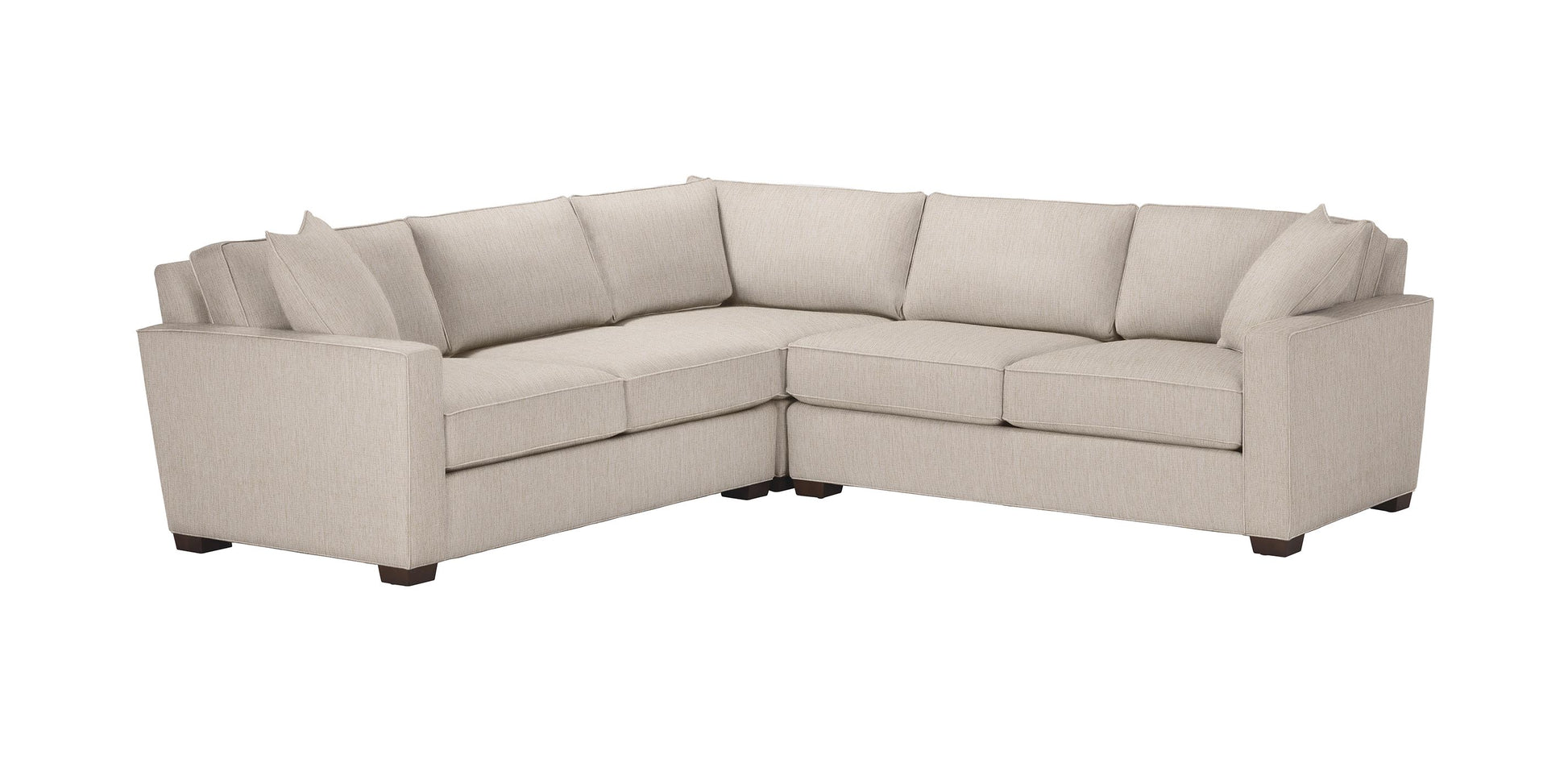 The Spencer Track-Arm 3-Piece Sectional, available for quick shipping, is a beige sofa with plush cushions arranged in a corner configuration, featuring square armrests and short wooden legs.