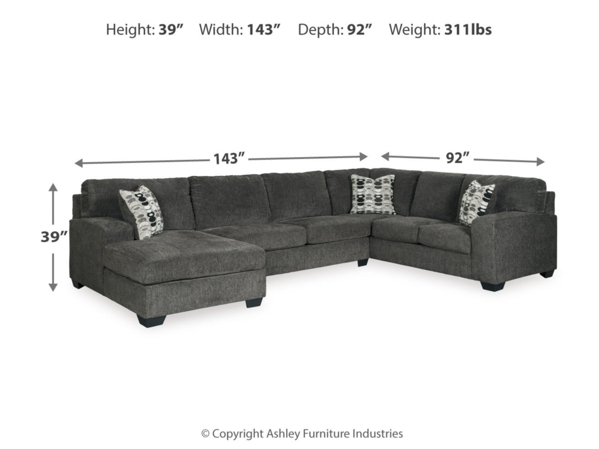 Ballinasloe 3-Piece Sectional with Chaise in gray features black legs and comes with three patterned cushions. Its dimensions are height 39 inches, width 143 inches, and depth 92 inches, with a total weight of 311 lbs. Image courtesy of Ashley Furniture Industries.