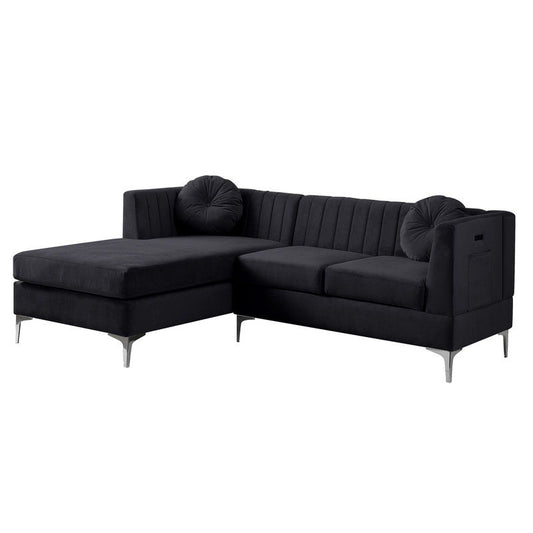 The Chloe Velvet Sectional Sofa Chaise offers a sleek, modern L-shape with vertical stitching, two round tufted pillows, and slim silver metal legs. It features a contemporary design and includes a USB charging port.