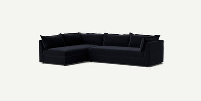 The Denver Two Piece Velvet L Shaped 119" Sectional in a modern black finish, featuring plush cushions, is showcased against a plain white background. Its sleek and minimalist design provides ample seating space.