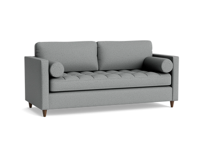 The Briar Sleeper Sofa, a contemporary gray fabric piece featuring two back cushions, two bolster pillows, and wooden legs against a black background, showcases a textured, tufted seat design.