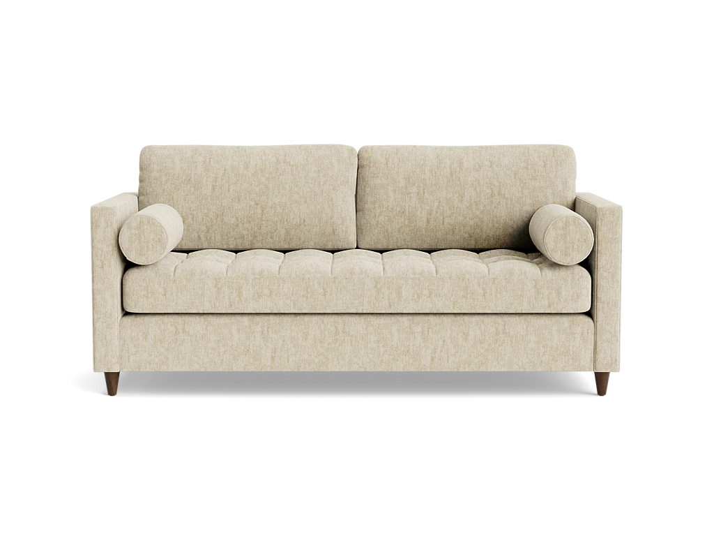 The Briar Sleeper Sofa, featuring a beige finish with a tufted seat, two rectangular back cushions, and cylindrical bolster pillows on either side, is set against a black background.