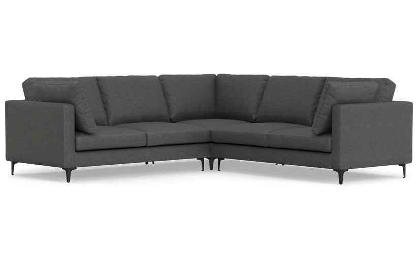 The Ava 90-Inch Mid Century Sofa features a dark grey L-shaped design with clean lines and a cushioned backrest. It includes square armrests and black metal legs, making it perfect for a modern living room.