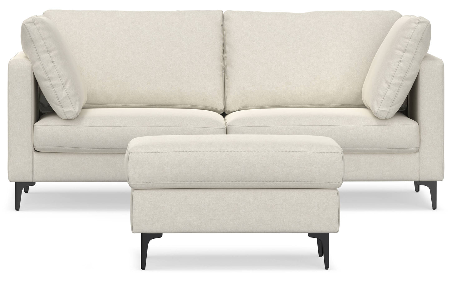 The Ava 90-Inch Mid Century Sofa is a light beige upholstered piece featuring two large back cushions and two armrest pillows. It comes with a matching rectangular ottoman, both highlighted by sleek, dark legs.