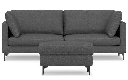 The Ava 90-Inch Mid Century Sofa in dark gray features a minimalist design with straight lines, supported by sleek black legs. It is upholstered in smooth, textured fabric and comes with two cushions and a matching ottoman to complete the modern look.