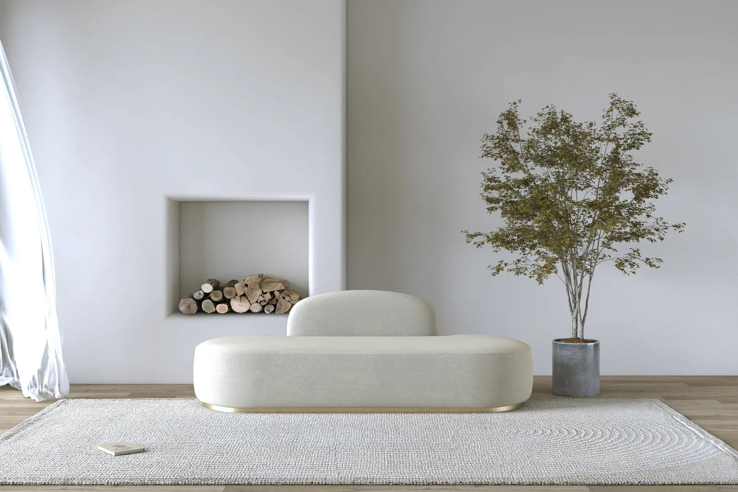 White boucle bench with a gold base sitting on a white rug with a tree in a pot next to it. 