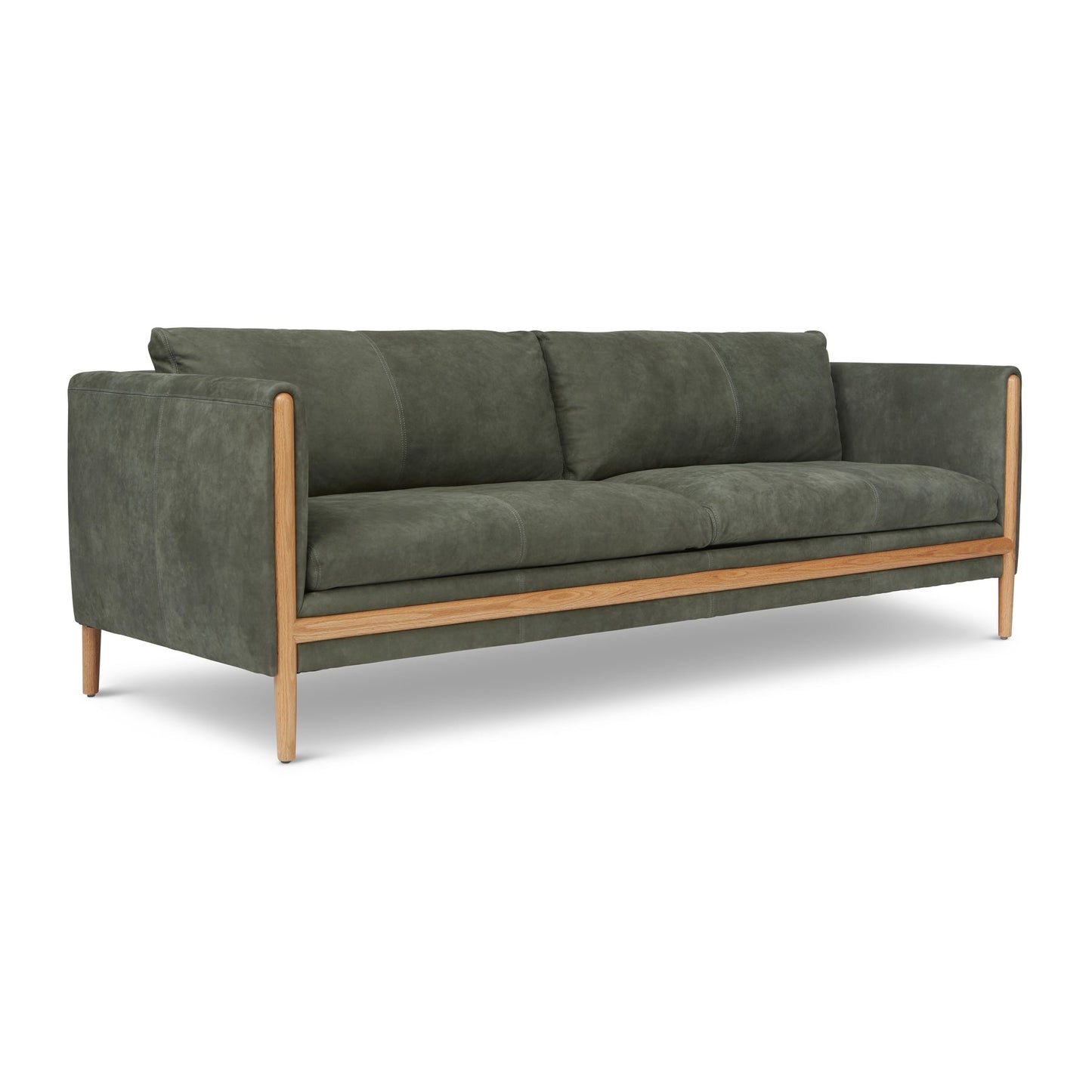 Introducing the Bungalow Leather Sofa in Verde, a sleek modern design featuring a rich suede-like leather texture. Accented with a sturdy wooden frame and slim legs, this sofa boasts three plush seat cushions and square armrests, embodying minimalist elegance.