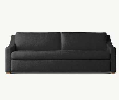 A dark gray Belgian Classic Slope Arm Premium Sleeper Sofa with clean lines and slightly angled armrests is set against a plain white background. This sofa boasts a minimalist and contemporary design, featuring a cushioned back and seat.