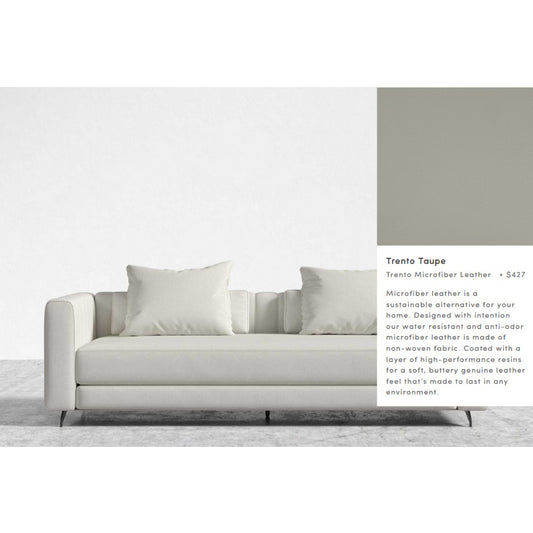 A modern, light beige sofa with two cushions is set against a white backdrop. Next to it, a descriptive panel details the Berlin Sleeper Sofa made of Trento Microfiber Leather, highlighting its sustainability and durability, priced at $427.