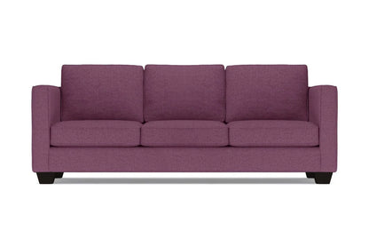 The Catalina Sofa is a three-seater in purple, featuring square arms and a modern design with three cushions and a low profile. It is displayed against a plain white background.