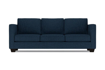 The Catalina Sofa is a dark blue, three-seater with a clean, modern design. It features three cushions and straight arms, set on short black legs, against a plain white background.