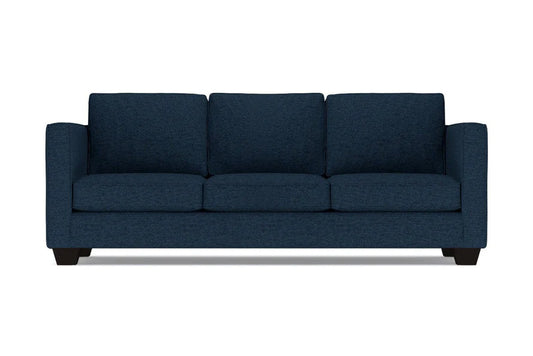 The Catalina Sofa is a dark blue, three-seater with a clean, modern design. It features three cushions and straight arms, set on short black legs, against a plain white background.