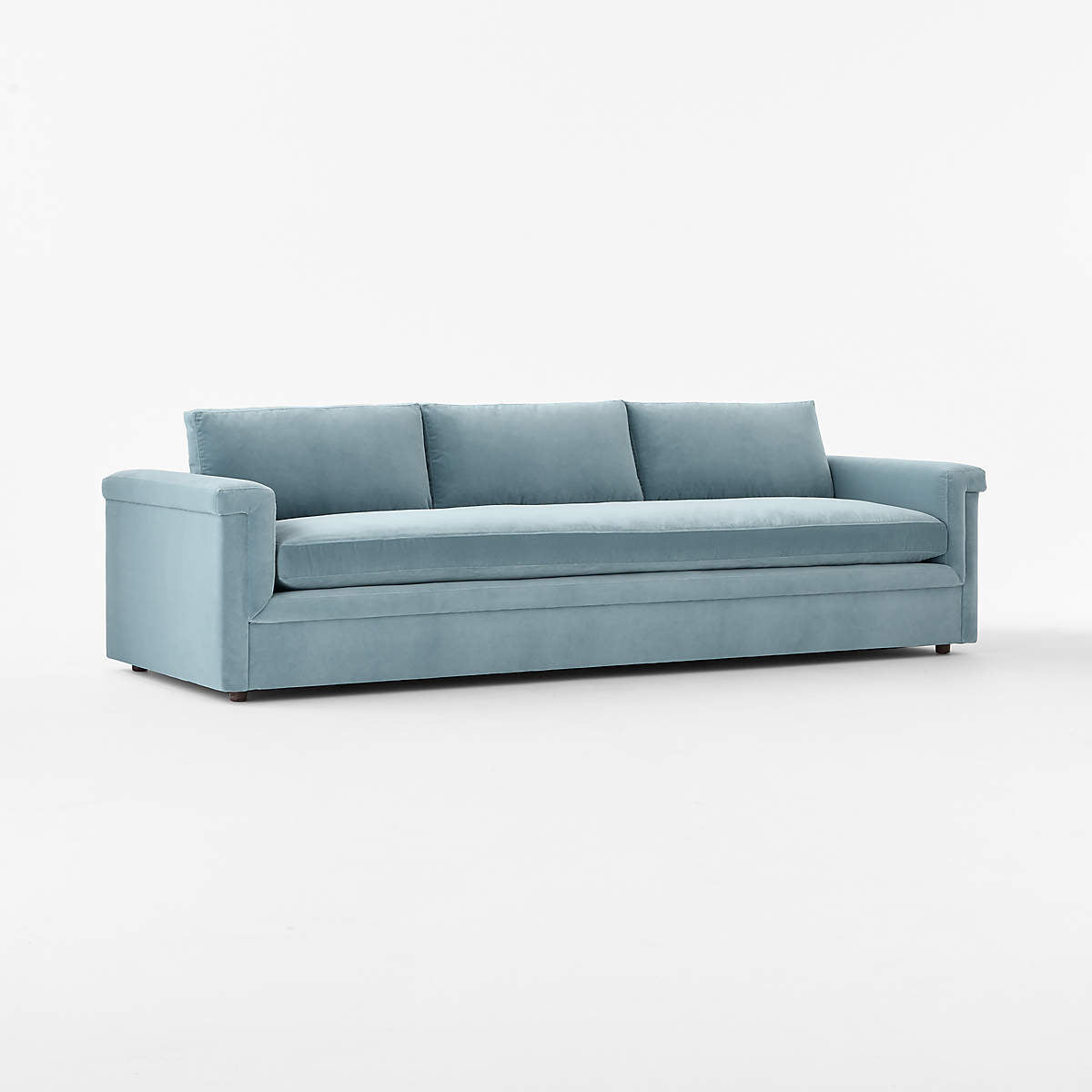 Ceva 103" light blue performance velvet sofa with a modern, streamlined design, featuring three seat cushions and three back pillows. Displayed against a plain white background.