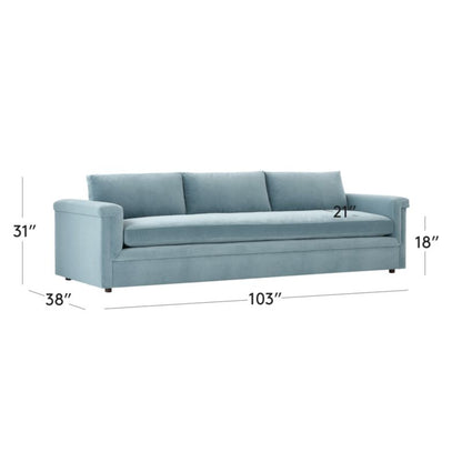 The Ceva 103" Light Blue Performance Velvet Sofa is a modern piece featuring three cushions and rounded armrests. Its dimensions are 31 inches tall, 103 inches wide, and 38 inches deep, with a seat height of 18 inches and a seat depth of 21 inches.