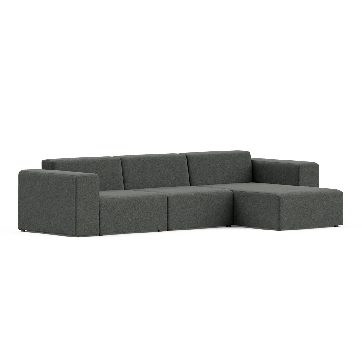 A contemporary dark gray Three-Seater Form Sectional featuring a minimalist design and right-hand chaise is positioned against a plain white background, accentuating its clean lines and modern style.