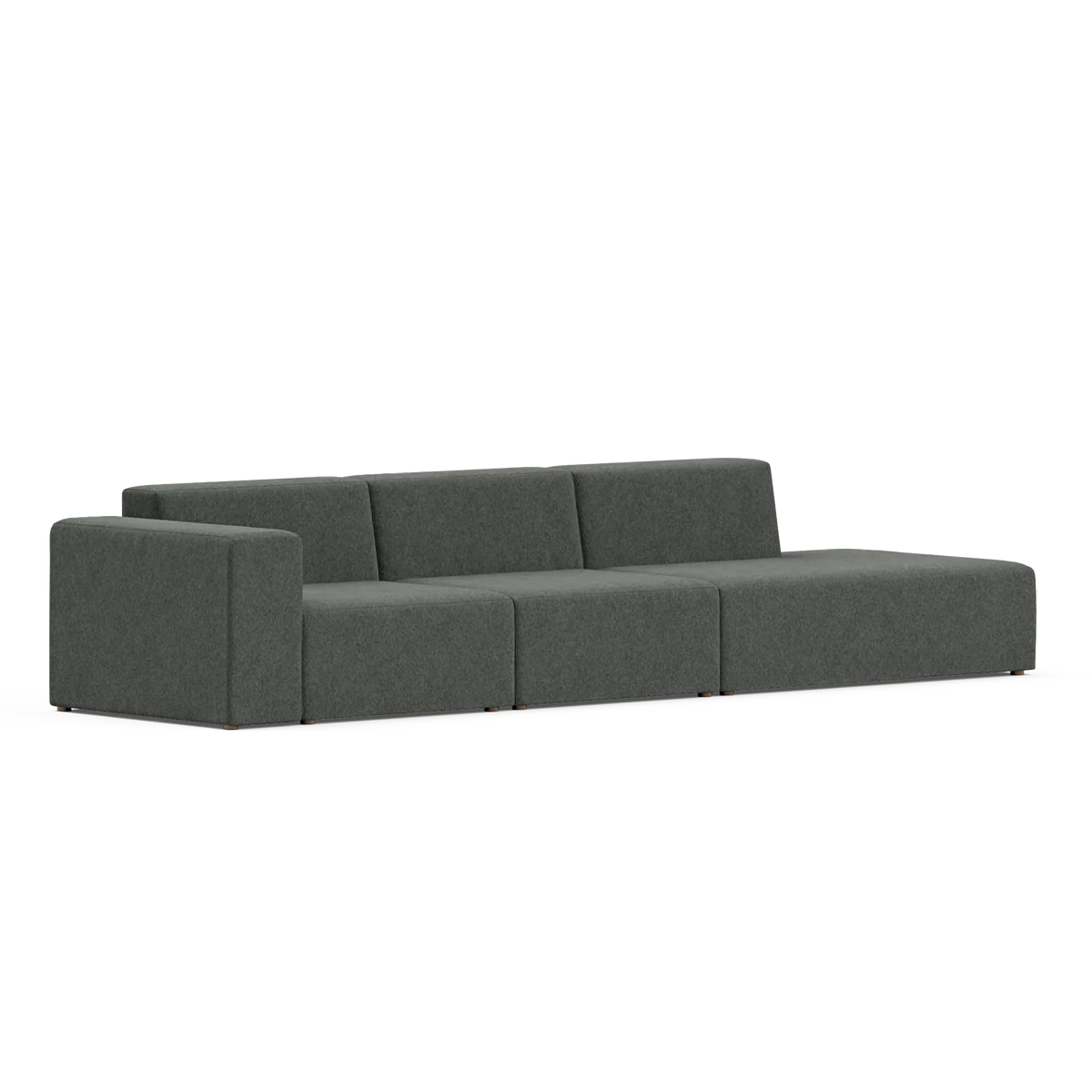 A contemporary, minimalist Three-Seater Form Sectional in dark gray features three cushioned seats and an extended right-side chaise. It showcases clean lines and a low profile against a plain white background.