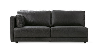 The Domus 74" Left Arm Leather Sofa in Ebony features a sleek, modern design with two large seat cushions and two back cushions, complemented by an additional smaller cushion on the left side. It stands on four small, cylindrical legs.